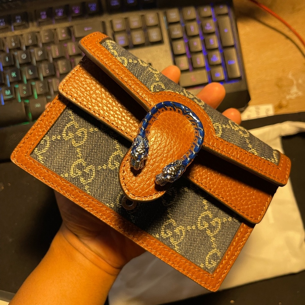 Gucci blue and brown crossbody bag.